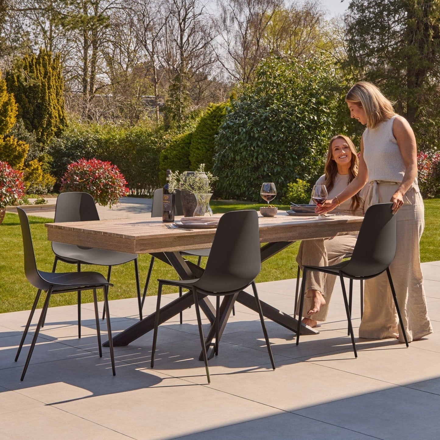 Amelia 6 Seater Wooden Garden Dining Set with Wren Black Chairs - Laura James