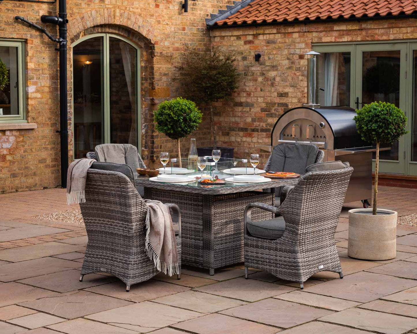 Marseille 4 Rattan Garden Chairs and Square Fire Pit Dining Table in Grey