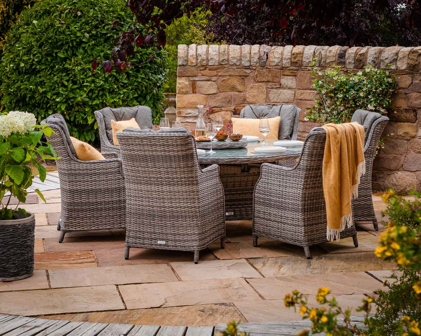 Riviera 6 Rattan Garden Dining Chairs and Large Round Table Set in Grey