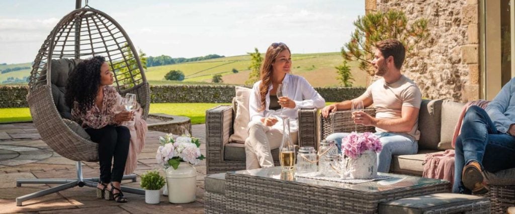 A picture of a couple of people enjoying time in the garden: alfresco entertaining