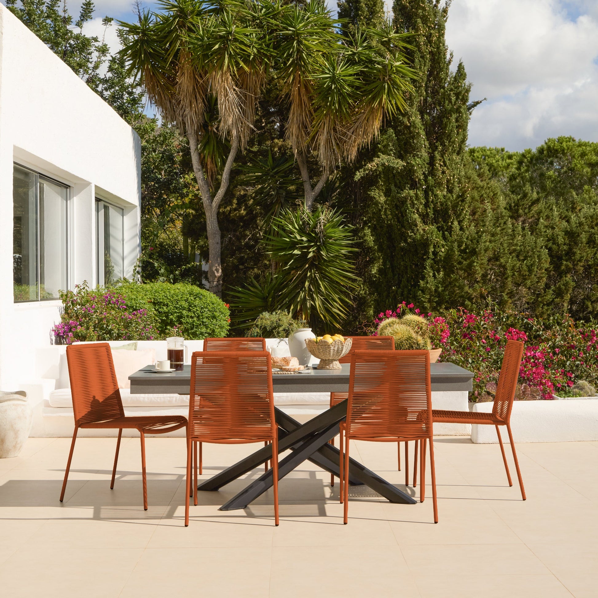 Amelia 6 Seater Dove Grey Concrete Garden Dining Set with Ryder Burnt Orange Chairs - Laura James
