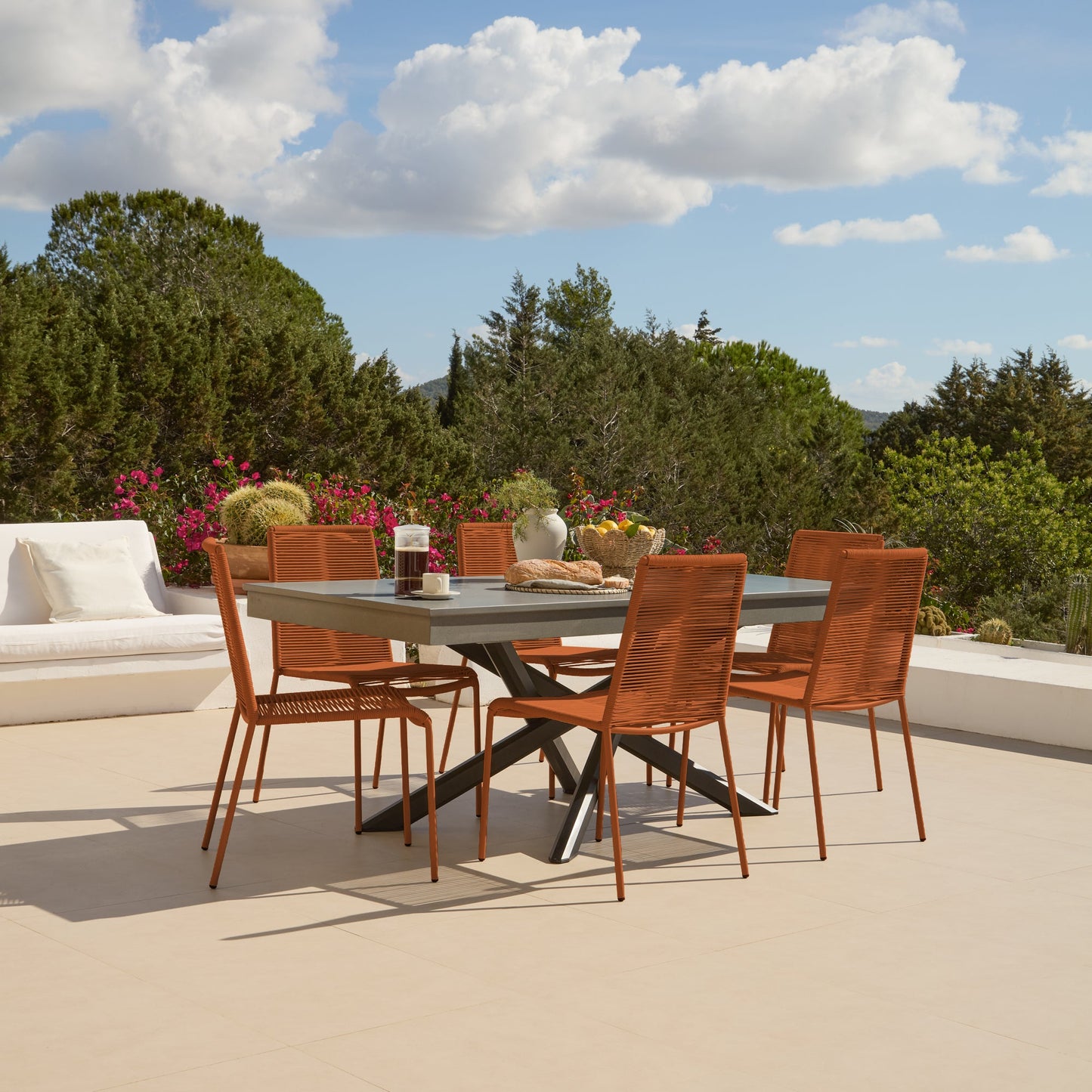 Amelia 6 Seater Dove Grey Concrete Garden Dining Set with Ryder Burnt Orange Chairs - Laura James