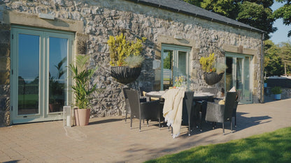 Cambridge 8 Rattan Garden Chairs and Large Round Dining Table Set in Black and Vanilla